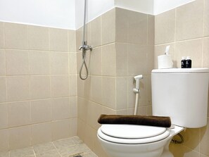 Standard Apartment, 1 Bedroom (Apartment) | Bathroom | Shower, free toiletries, towels - Tidy and Warm 2BR at Podomoro Golf View Apartment (Gunung Putri)