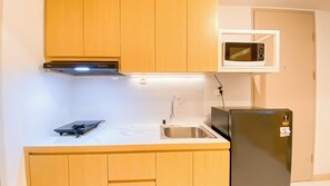 Standard Apartment, 1 Bedroom (Apartment) | Private kitchen | Fridge - Comfy and Modern Look 2BR Apartment at Tokyo Riverside PIK 2 (Teluknaga)