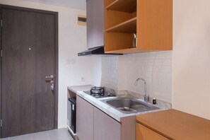 Standard Studio, 1 Bedroom (Apartment) | Private kitchen | Fridge, rice cooker - Cozy Studio Apartment at Bintaro Icon (South Tangerang)