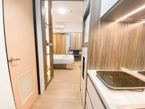 Private kitchen - Cozy and Homey Studio at The Alton Apartment (Semarang)