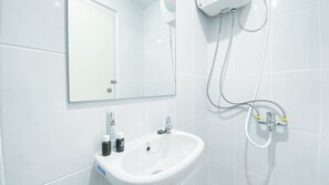 Standard Studio, 1 Bedroom (Apartment) | Bathroom | Shower, free toiletries, towels - Cozy Style Studio Apartment at Tokyo Riverside PIK 2 (Teluknaga)