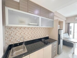 Standard Apartment, 1 Bedroom (Apartment) | Private kitchen | Fridge, rice cooker - Cozy Stay 2BR at Tanglin Supermall Mansion Apartment (Surabaya)