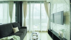 สแตนดาร์ดอพาร์ทเมนท์, 1 ห้องนอน (Apartment) | บริเวณนั่งเล่น