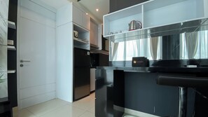 Standard Apartment, 1 Bedroom (Apartment) | Private kitchen | Full-size fridge, stovetop, rice cooker - Spacious 1BR at Tree Park City BSD Apartment (South Tangerang)