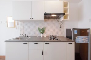 شقة عادية - غرفة نوم وا�حدة (Apartment) | مطبخ خاص