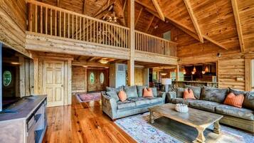 TV connectée, cheminée, lecteur de DVD, baby-foot