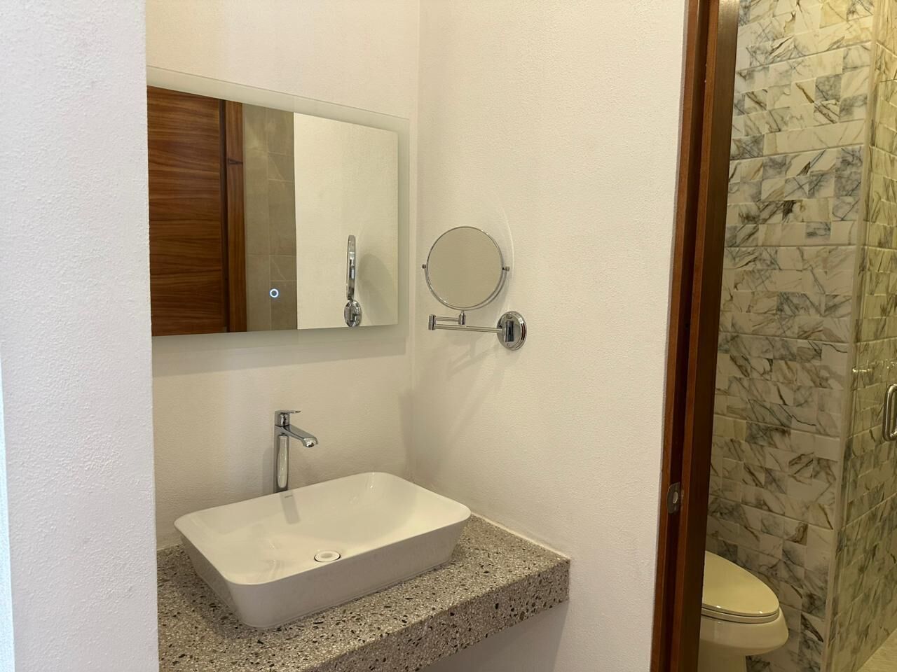 Shower, rainfall showerhead, hair dryer, towels