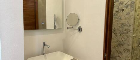 Shower, rainfall showerhead, hair dryer, towels