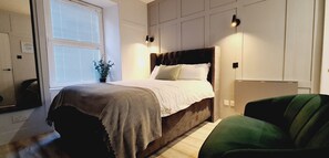 1 slaapkamer, een strijkplank/strijkijzer, wifi, beddengoed