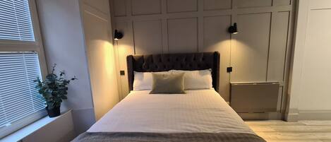 1 slaapkamer, een strijkplank/strijkijzer, wifi, beddengoed