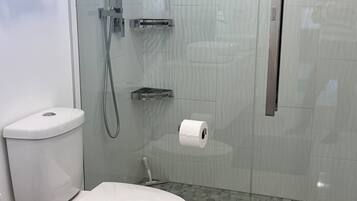 Shower, hair dryer, towels, soap