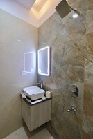 Shower, rainfall showerhead, towels, soap