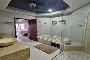 Jetted tub, hair dryer, towels, soap