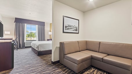 Studio, 1 King Bed with Sofa bed, Mobility Accessible, Non Smoking (Single King) | Desk, iron/ironing board, free WiFi, bed sheets. Cobblestone Hotel & Suites - Foley