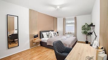 2 bedrooms, desk, iron/ironing board, travel crib