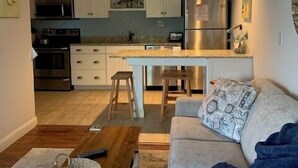 Living area - Located just steps from Wells Beach, Eastwinds 124 is perfect for your getaway. (Wells)