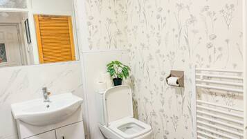 Hair dryer, towels, soap, toilet paper