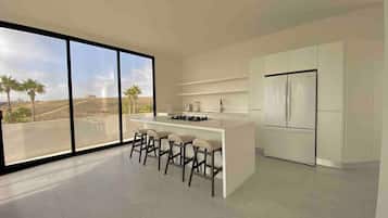 Fridge, microwave, stovetop, coffee/tea maker