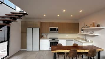 Fridge, stovetop, coffee/tea maker, cookware/dishes/utensils