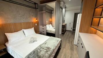 Apartamento Premium | 1 dormitorio, cortinas opacas, wifi gratis y ropa de cama