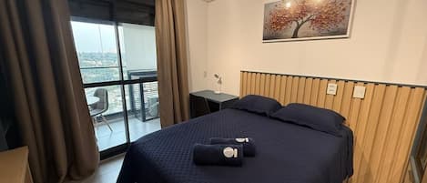 Apartamento superior | 1 quarto, cortinas blackout, Wi-Fi de cortesia