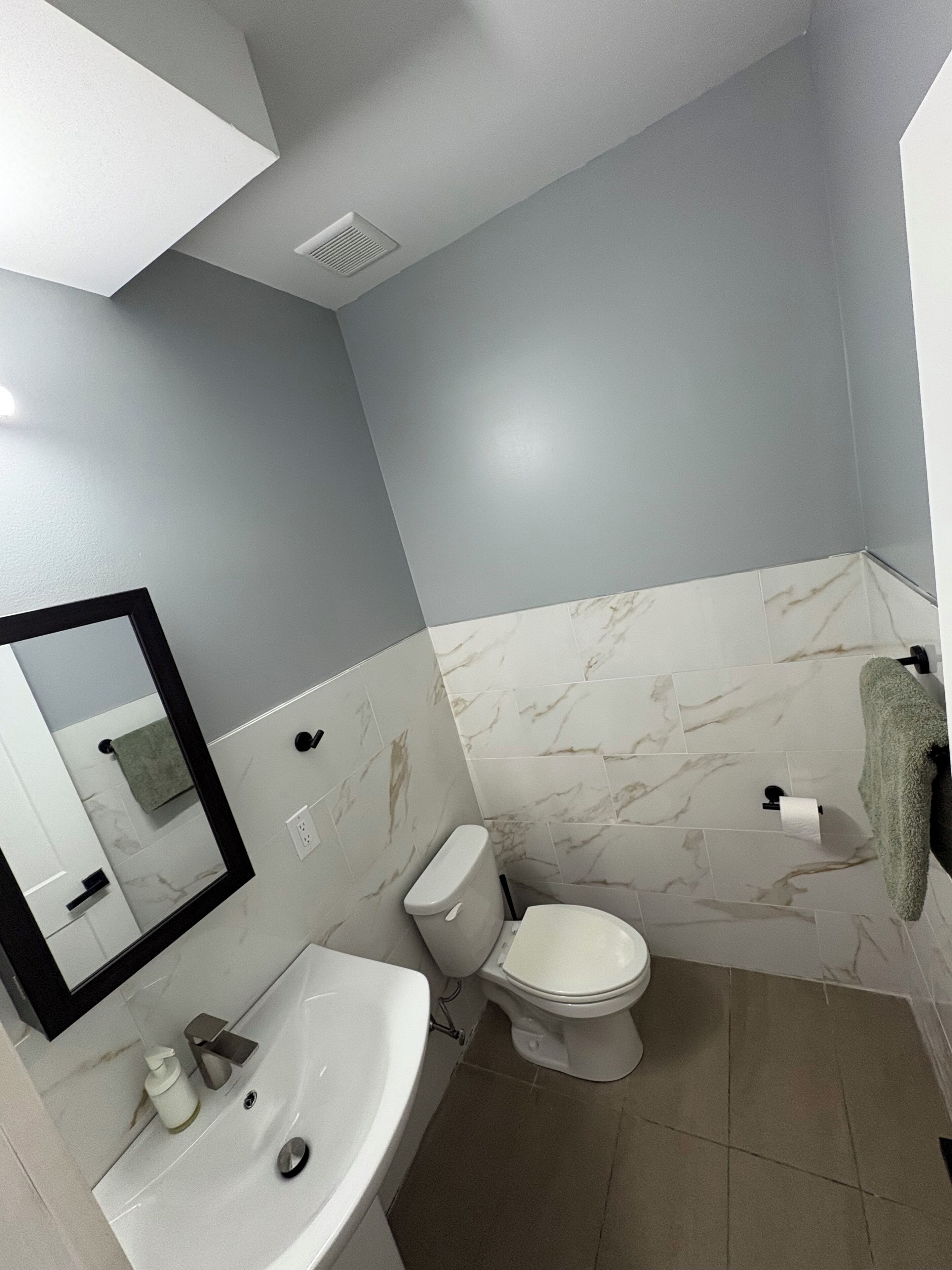 Shower, towels, soap, toilet paper