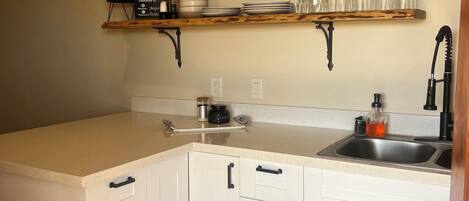 Fridge, microwave, coffee/tea maker, toaster