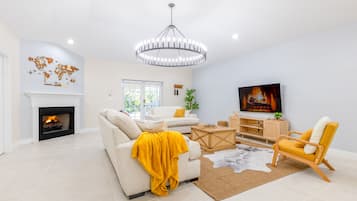 Smart TV, fireplace, table tennis, books