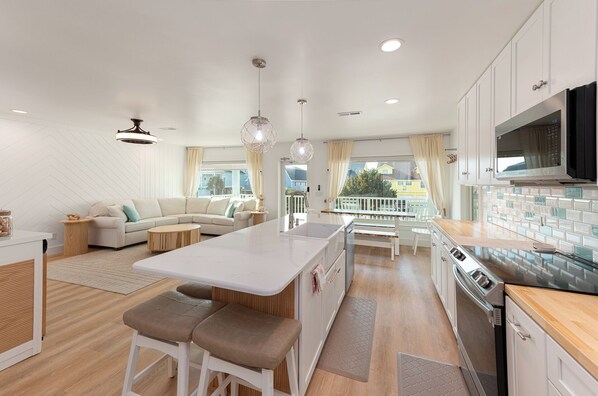 Fridge, microwave, oven, stovetop - Brand new home 'Totally Decked Out' - Dog-Friendly, 4 bedrooms, 3 bathrooms, and stunning views. (Holden Beach)