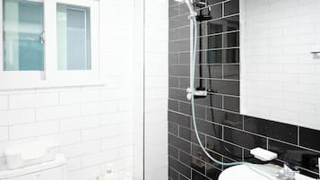 Hair dryer, towels, soap, toilet paper