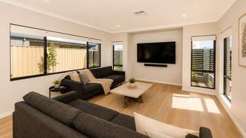 House, Multiple Beds, Non Smoking | Living area | 65-inch Smart TV with satellite channels