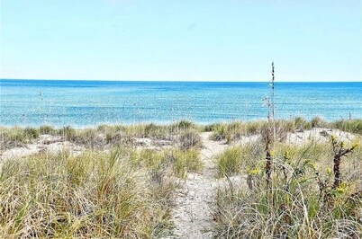 Your own private beach with this charming 3-bedroom beachfront house!