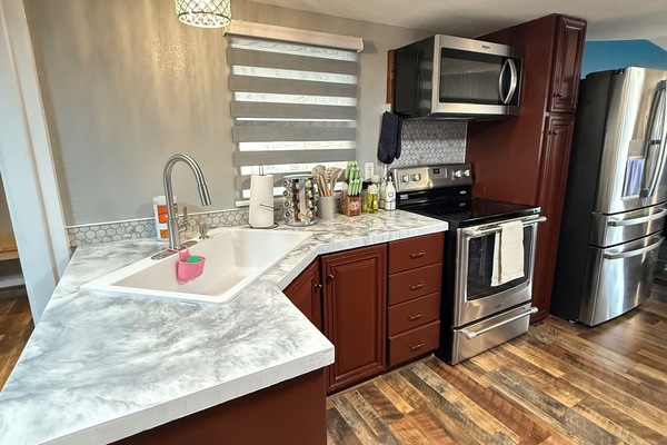 Frigorífic, microones, forn i placa de cuina