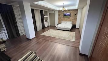 Family Double Room, Balcony, Mountain View | Desk, laptop workspace, blackout drapes, soundproofing