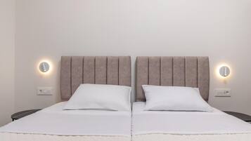4 slaapkamers, een strijkplank/strijkijzer, gratis wifi, beddengoed