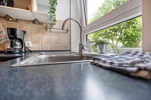 Frigorífico, horno, placa de cocina y lavavajillas