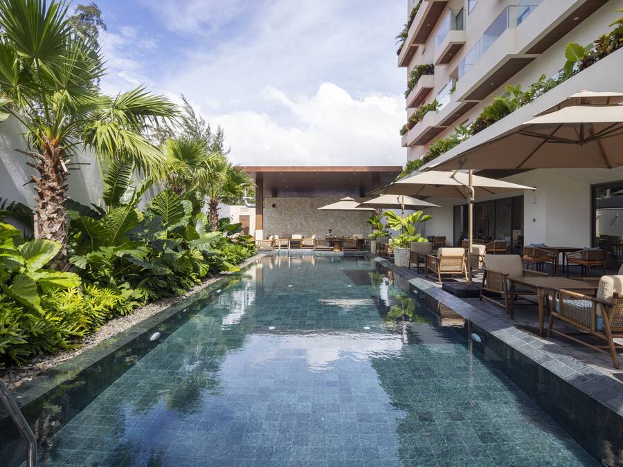 Outdoor pool, open 6:30 AM to 7:00 PM, pool umbrellas, sun loungers