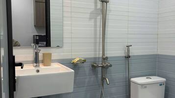 Shower, free toiletries, hair dryer, slippers