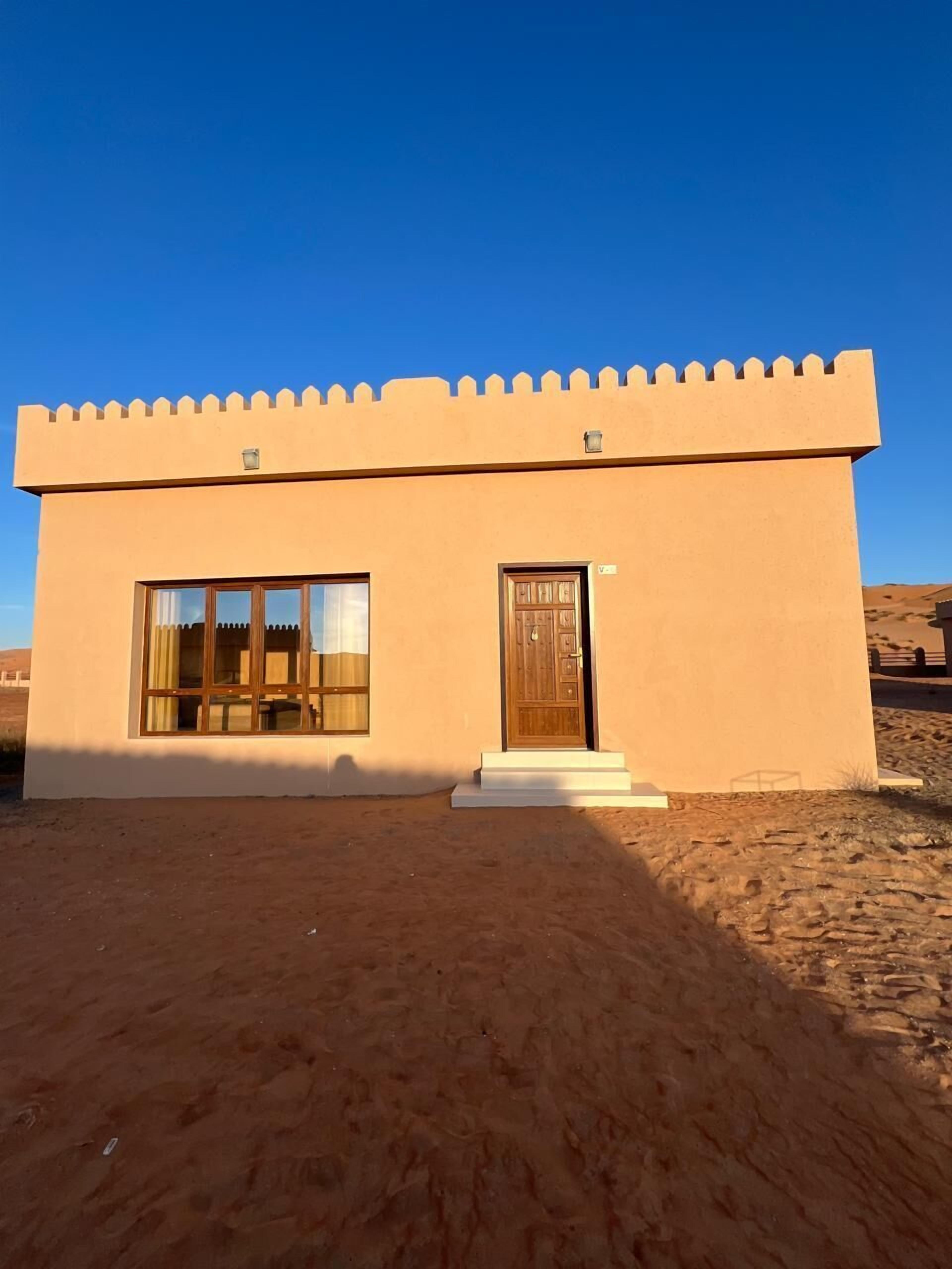 A small, single-story building with a flat roof and a simple facade.