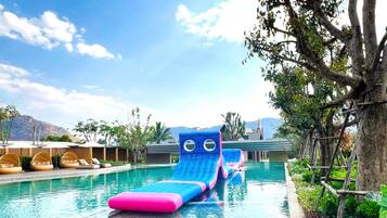 Outdoor pool, pool umbrellas, sun loungers