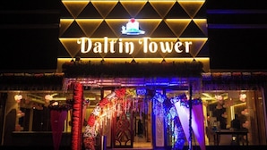 A hotel entrance with a geometric facade and a sign reading "Daltin Tower". - Daltin Tower Digha (Kanthi)