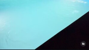 A swimming pool at night with a dark sky and distant mountains. - Xinali Hotel Xizi  (Altiagach)
