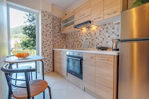 Private kitchen - Tramonto Studio: Ipsos Beach at Your Doorstep (Ypsos)