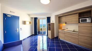 Suite, vistas al mar | Zona de estar