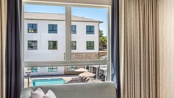 In-room safe, desk, laptop workspace, blackout curtains