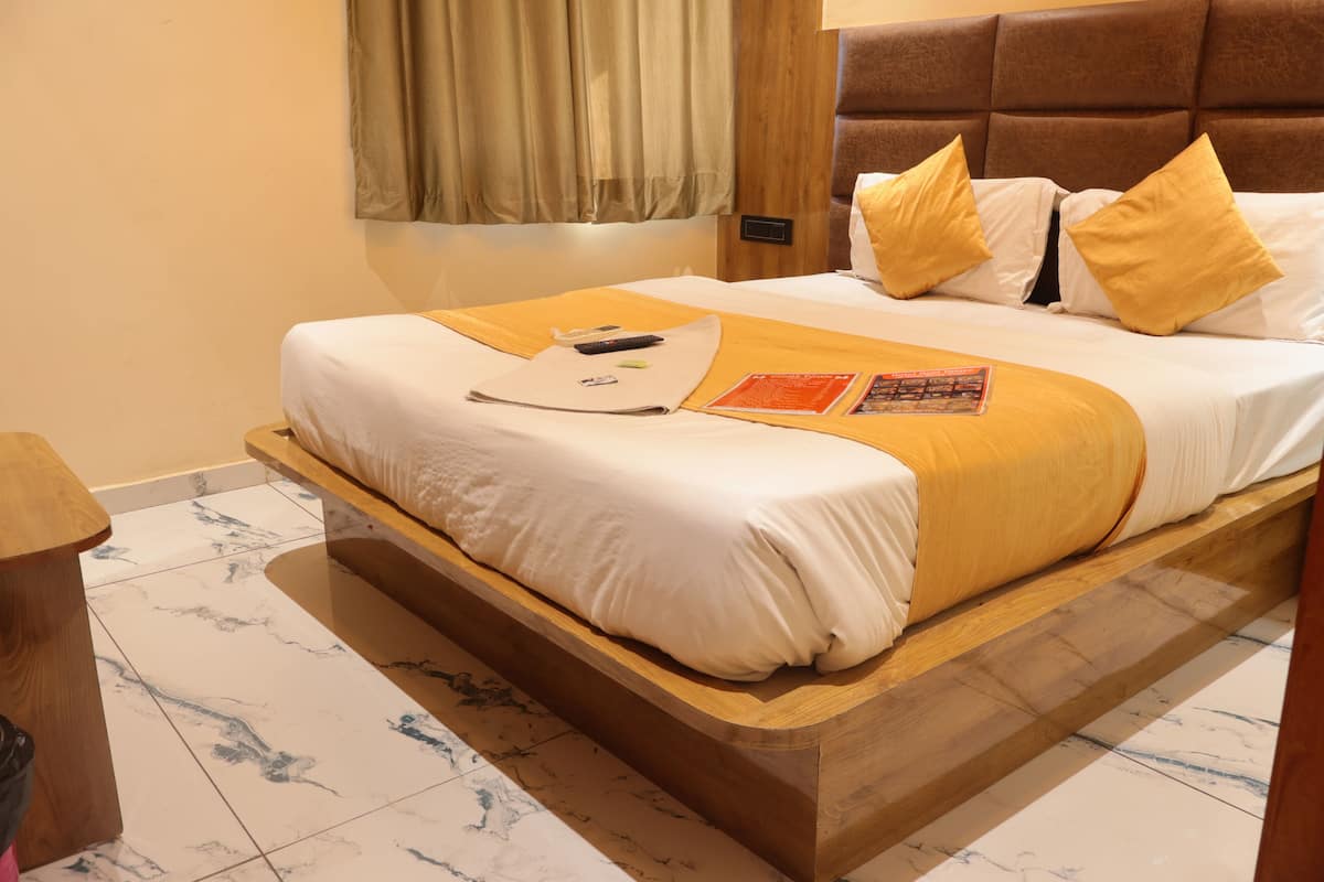 Deluxe eenpersoonskamer | Lakens van Egyptisch katoen, luxe beddengoed, een bureau, gratis wifi