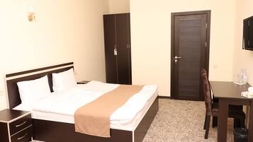 Economy Double or Twin Room | In-room safe, blackout curtains, iron/ironing board, free WiFi