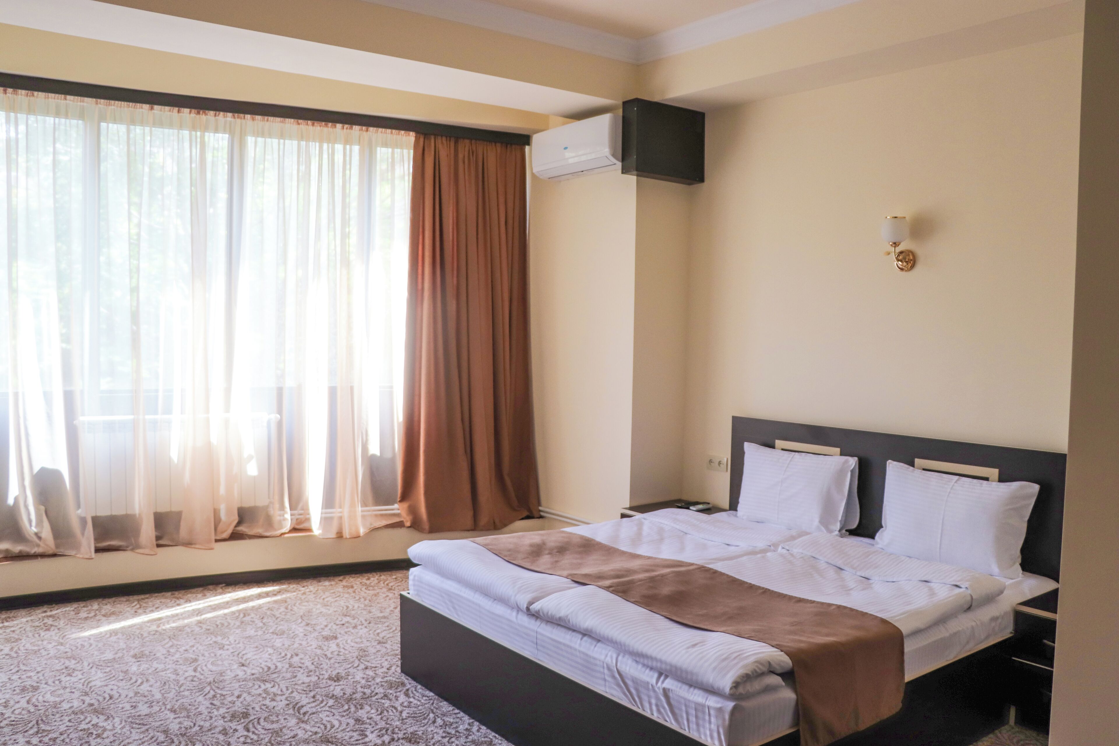Economy Double or Twin Room | In-room safe, blackout drapes, iron/ironing board, free WiFi