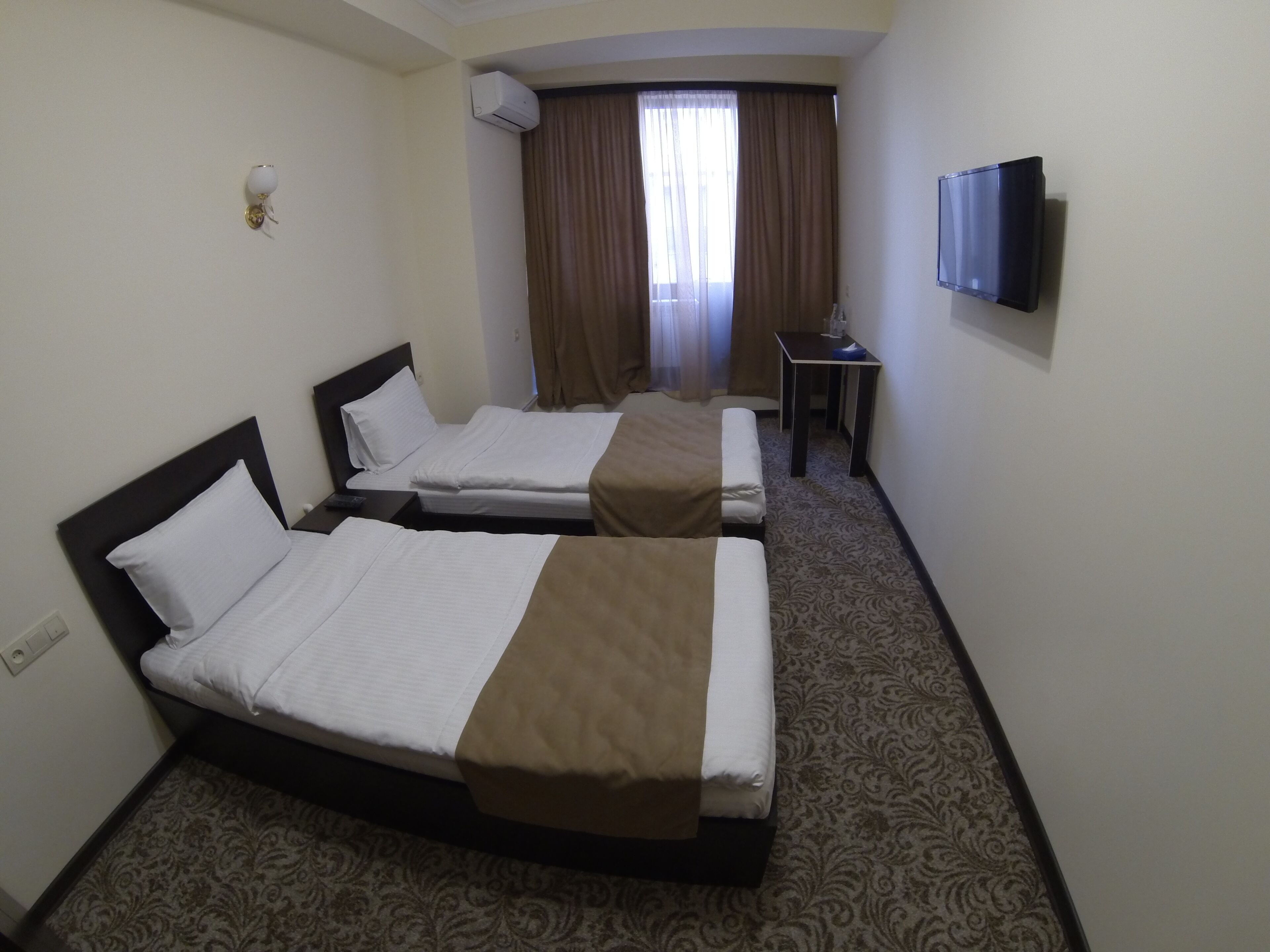 Economy Twin Room | In-room safe, blackout drapes, iron/ironing board, free WiFi