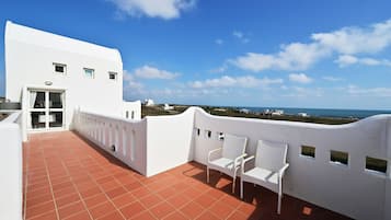 Habitació quàdruple Deluxe, vistes al mar | Vista des de l'habitació